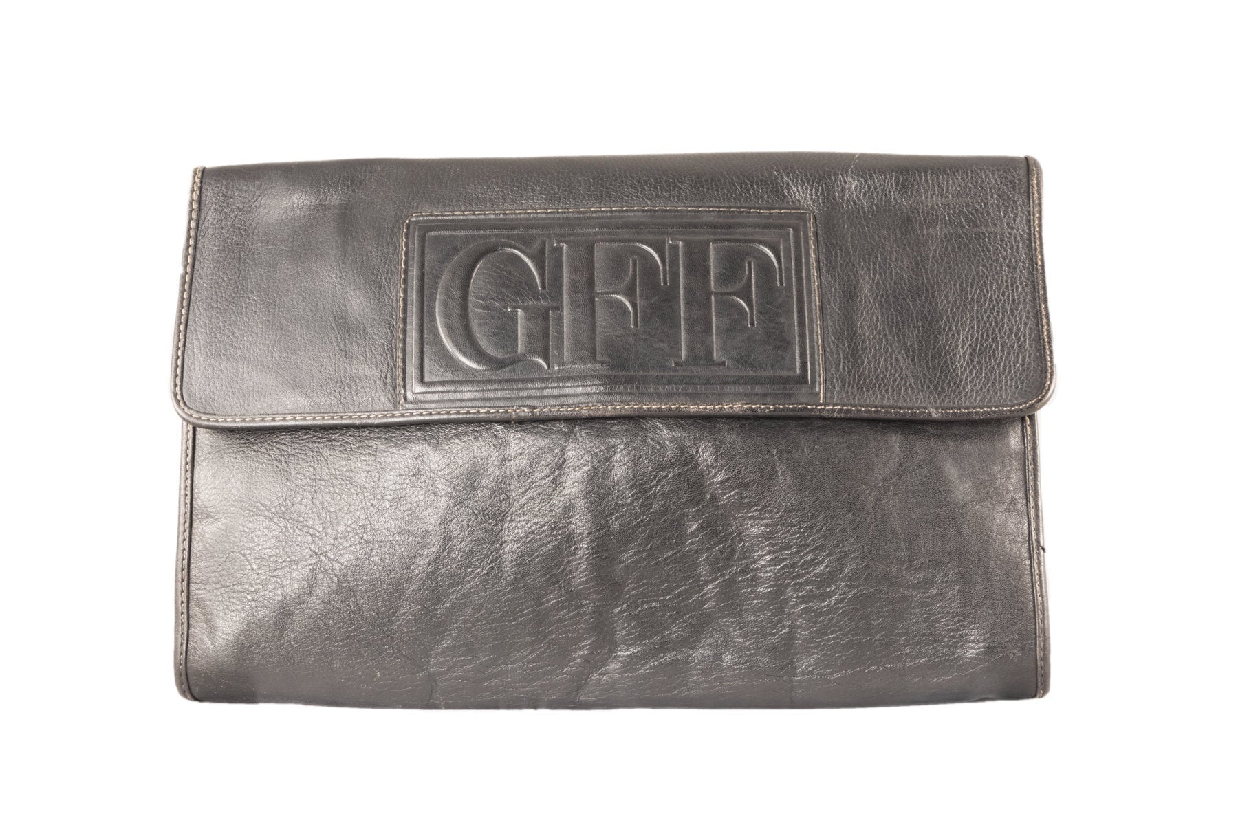 Pochette Gianfranco Ferrè anni '80 in pelle nera con chiusura magnetica | Gianfranco Ferrè 80s pochette. - Natural Born Humans Store